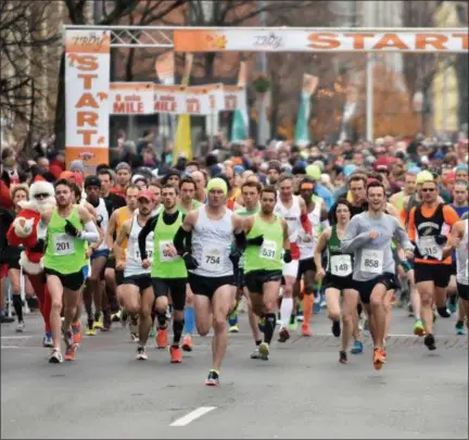  ?? PHOTO PROVIDED BY TROY TURKEY TROT ?? Photo from the starting line of the 2017Troy Turkey Trot