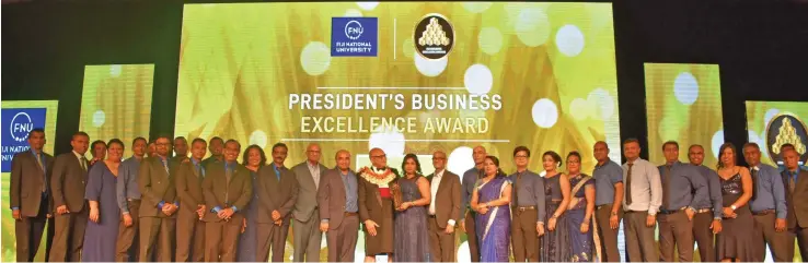  ?? Waisea Nasokia ?? Jack’s of Fiji staff receive the President’s Business Excellence award from President Major-General (Ret’d) Jioji Konrote during the Fiji National University 2019 Fiji Business Excellence Awards at the Sheraton Fiji Resort, Denarau, Nadi on November 2, 2019. Photo: