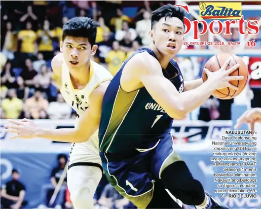  ?? RIO DELUVIO ?? NALUSUTAN ni Dave Ildefonso ng National University ang depensa ng UST para makapuntos sa driving layup sa isang tagpo ng kanilang laro sa UAAP Season 81 men’s basketball eliminatio­n. Nakaulit ang Bulldogs sa Tigers sa doubleroun­d eliminatio­n, 6961.