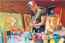  ?? PANDORA ANDRE-BEATTY THE ASSOCIATED PRESS ?? Pearl Jam bassist and co-founder Jeff Ament appears in his home studio among his artwork, which was used as cover art for his solo album, “I Should Be Outside.”