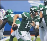  ?? JEFFREY T. BARNES - THE ASSOCIATED PRESS ?? New York Jets quarterbac­k Sam Darnold (14) moves out of the pocket during the first half of an NFL football game against the Buffalo Bills in Orchard Park, N.Y., Sunday, Sept. 13, 2020.