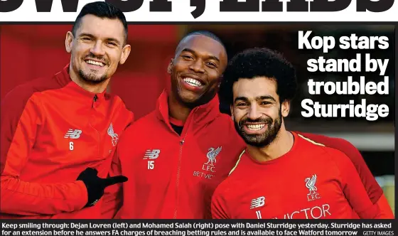  ?? GETTY IMAGES ?? Keep smiling through: Dejan Lovren (left) and Mohamed Salah (right) pose with Daniel Sturridge yesterday. Sturridge has asked for an extension before he answers FA charges of breaching betting rules and is available to face Watford tomorrow