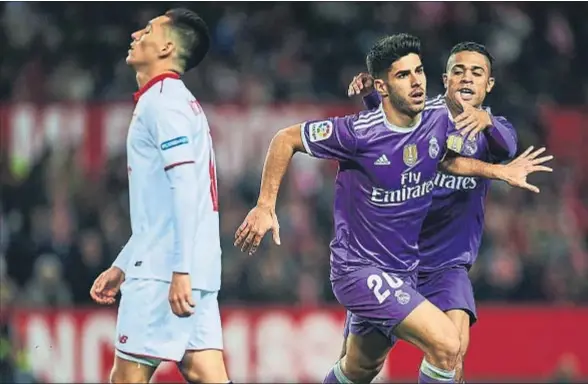  ?? AITOR ALCALDE / GETTY ?? El gol de Marco Asensio, que recorrió 70 metros con el balón y regateó a dos defensas antes de marcar, puso imposible la remontada del Sevilla