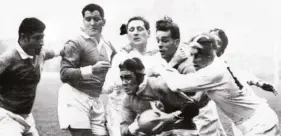  ??  ?? Arm wrestle: England battle France en route to the Grand Slam in 1957
