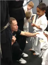  ?? Courtesy photo ?? Freddy Bouciegues, left, works with Dominic Blackwell at the Martial Arts Fitness Center in Canyon Country, which is closing after 18 years in business.