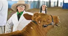  ??  ?? Eric Cassells, 15, from Wyreema, enjoys the atmosphere at the Queensland Beef Expo yesterday.