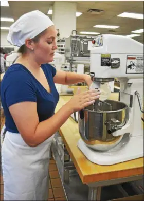  ?? SUBMITTED ?? Samantha Nelson, an 11th-grader from Keystone, is already learning new skills in the bakery and pastry arts lab.