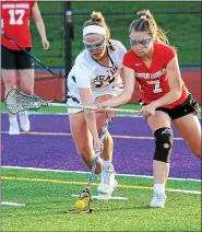  ?? MEDIANEWS GROUP FILE PHOTO ?? Upper Moreland’s Mary Grace Wood battles Upper Dublin’s Mack Moore for possession.