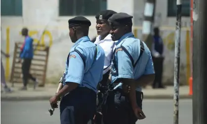  ?? Photograph: Brian Inganga/AP ?? Kenya police patrol the streets of Nairobi, Kenya, on 12 March.