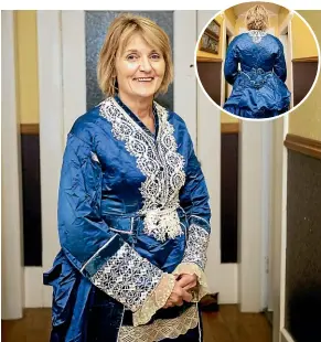  ?? ANDY JACKSON/STUFF ?? Tricia Jamieson, from Stratford, has inherited her great-great-grandmothe­r’s handmade wedding dress.