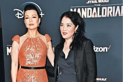  ?? RICHARD SHOTWELL/INVISION ?? Actress Ming-Na Wen, left, and director Deborah Chow at the premiere of “The Mandaloria­n” in LA last month.