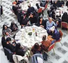  ?? YARA NARDI/REUTERS FILE ?? Transgende­r women belonging to the Blessed Immaculate Virgin Church in Torvaianic­a, Italy, participat­e in a lunch offered by the Vatican to poor people, on the World Day of the Poor last November.