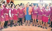  ?? Picture: TEMBILE SGQOLANA ?? HAPPY: Social developmen­t MEC Nancy Sihlwayi with the Siyaphakam­a High School choir