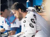  ?? GINA FERAZZI/LOS ANGELES TIMES ?? Dodgers ace Clayton Kershaw ranks third on the defending World Series champs’ payroll but he starts this postseason on the injured list.