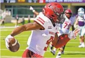  ?? CHARLIE RIEDEL AP ?? Arkansas State’s Jonathan Adams Jr. celebrates after scoring the winning TD against Kansas State.