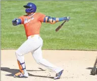  ?? Kathy Willens / Associated Press ?? The New York Mets’ Yoenis Cespedes bats in a simulated game, part of the Mets summer training camp workout at Citi Field, on Thursday.