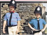  ??  ?? COPPER TOPS Wills and Harry play dress-up