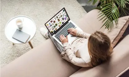  ??  ?? Woman using laptop at home. ‘Life during lockdown would have been even more difficult without reliable broadband to work, learn, play and see loved ones,’ says Lindsey Fussell, of Ofcom. Photograph: LightField Studios Inc./Alamy StockPhoto