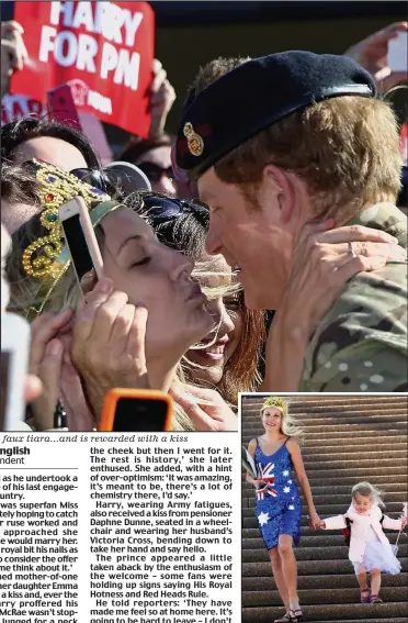  ??  ?? On a mission: Victoria McRae waits to catch Harry’s eye with her placard and faux tiara…and is rewarded with a kiss
Happy: She leaves with her daughter