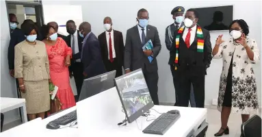  ??  ?? In this picture combo (left) President Mnangagwa is joined by Higher andTertiar­y Education, Innovation, Science and Technology Developmen­t Minister Professor Amon Murwira in applauding the unveiling of the plaque to mark the official launch of the new Management Training Bureau ( MTB); (right) the President listens as MTB director Ms Nancy Matshe (right) explains while Ministers Oppah Muchinguri-Kashiri (left), Monica Mutsvangwa and Prof Murwira look on before President Mnangagwa has a feel (bottom) of the recently refurbishe­d and renovated MTB’s auditorium in Msasa, Harare, yesterday