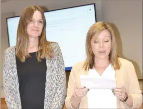  ?? ?? Ms. Carolyn Armour was presented to the Pea Ridge School Board by principal Darah Bennett as teacher of the year. Bennett said Armour is “amazing.”