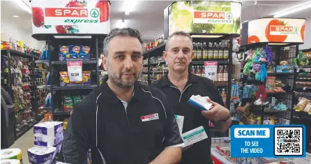  ?? ?? Duncan Harvey and Grant Hawker say they feel like giving up after having their Spar Express Oxenford broken into three times in less than six months. Picture: Glenn Hampson