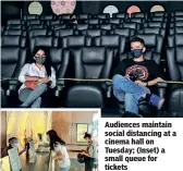  ??  ?? Audiences maintain social distancing at a cinema hall on Tuesday; (Inset) a small queue for tickets