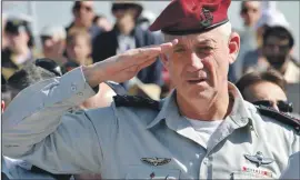  ??  ?? A salute at Ariel Sharon’s grave in 2015 (above) and launching Blue & White with Yair Lapid earlier this year