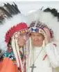  ?? GREGORIO BORGIA/AP ?? Pope Francis puts on an Indigenous headdress he received Monday near Edmonton, Alberta.