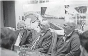  ?? COURTESY BRUCE WATERFIELD, OSU ATHLETICS] [PHOTO ?? Cecil O’Brate, center, laughs with Oklahoma State athletic director Mike Holder, left, and baseball coach Josh Holliday during a meeting with reporters Thursday.