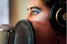  ??  ?? Singer Yasmin Radbod records harmonies Thursday at a Santa Fe studio. Radbod will release a music video for her song ‘So Good’ on Tuesday.
