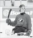  ?? TODD KOROL THE CANADIAN PRESS ?? Ryan Straschnit­zki, who was paralyzed in April’s Humboldt Broncos bus crash, practises his sledge hockey skills in Calgary.