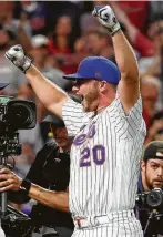  ?? Gregory Shamus / Getty Images ?? The Mets’ Pete Alonso rejoices after putting away fellow rookie Vladimir Guerrror Jr. of the Blue Jays in the final.