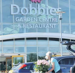  ??  ?? Green fingered The new rules will see the likes of Dobbies in Perth shut in an attempt to prevent the virus spreading