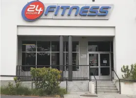  ?? Lea Suzuki / The Chronicle ?? 24 Hour Fitness said it has about $1.4 billion in debt plus lease obligation­s. It is not charging membership fees while locations are temporaril­y closed.