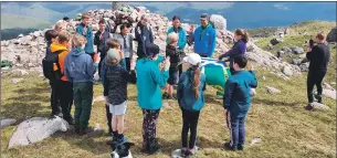  ??  ?? Far left, Ardchattan Scout troop scaled the the heights above Glen Creran for a ceremony to welcome new recruits, these youngsters pictured were already members; and left , Ardchattan Scout troop welcomes new recruits at a ceremony at the top of Glen Creran, 810m up.