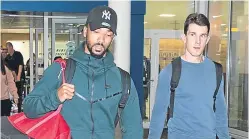  ??  ?? Ryan Jack, right, with Shay Logan after arriving back at Glasgow Airport after their winter break in Dubai.