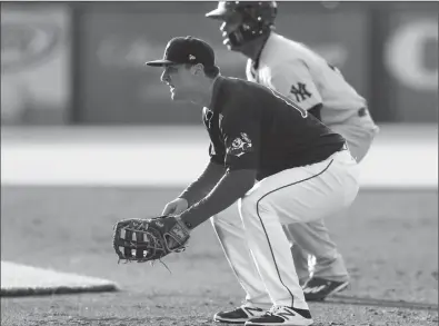  ?? Photo by Louriann Mardo-Zayat / lmzartwork­s.com ?? After struggling at the plate in April (.233 batting average), first baseman Sam Travis (above, left) hit .33 with a .389 on-base percentage for the PawSox in May to earn his first promotion to the Red Sox Wednesday.