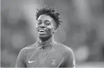  ?? AP Photo/Christophe Ena ?? ■ Paris Saint-Germain’s Timothy Weah smiles as he trains before the French League One soccer match between PSG and Angers on May 14 at the Parc des Princes Stadium in Paris.