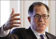  ?? STEPHAN SAVOIA / ASSOCIATED PRESS ?? Dell CEO Michael Dell speaks at a Boston College luncheon. A Giving USA report said giving from individual­s, estates, foundation­s and corporatio­ns reached an estimated $410 billion in 2017.