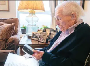  ?? PIERRE OBENDRaUF ?? Robert Wiener reads a reporter’s questions from his home in Montreal on Monday. “I’m just lucky to have good genes,” he says. He is possibly the oldest person alive in Canada. He turned 110 last month.