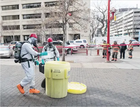 ?? LIAM RICHARDS ?? The Saskatoon Fire Department hazardous materials unit recovers a suspicious package at Saskatoon Square on Tuesday, Five recent incidents involving suspicious white powder have cost the city $75,650, the fire department says.