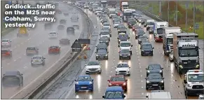  ?? ?? Gridlock...traffic on the M25 near Cobham, Surrey, yesterday