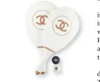  ??  ?? Nothing else says you are ultra-fashionabl­e than these Chanel beach rackets and matching balls. With Chanel’s interlocki­ng “c” logo, these are the definition of sporty chic.