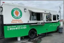  ?? (Arkansas Democrat-Gazette/Eric E. Harrison) ?? A Tacos Atilano truck is parked more or less permanentl­y on a lot in North Little Rock’s Levy neighborho­od.