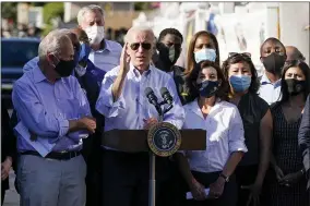  ?? AP PHOTO/EVAN VUCCI ?? President Joe Biden speaks as he tours a neighborho­od impacted by flooding from the remnants of Hurricane Ida, Tuesday, Sept. 7, 2021, in the Queens borough of New York.