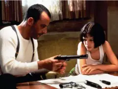  ??  ?? The hitman and her: Reno alongside a 12-year old Natalie Portman in ‘Leon’ (Rex)