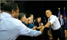  ?? AP/PABLO MARTINEZ MONSIVAIS ?? President Barack Obama greets audience members Wednesday before speaking at Concord Community High School in Elkhart, Ind.
