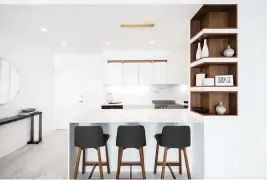  ?? Courtesy of IG Workshop ?? White kitchens are still in style, but the whites may be mixed with woods or other colors.
