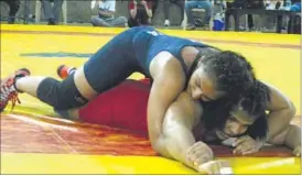  ??  ?? Olympian Geeta Phogat (Blue) in action during selection trials of the Indian squad in Lucknow on Monday.